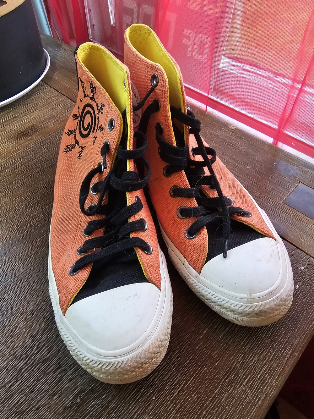 Converse x Naruto Shippuden Chuck Taylor All Star Hi sneakers in the "Pale Magma
